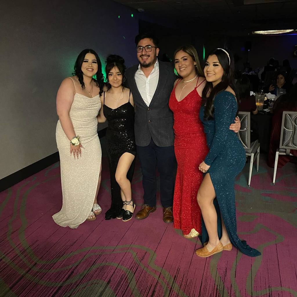 students posing during prom