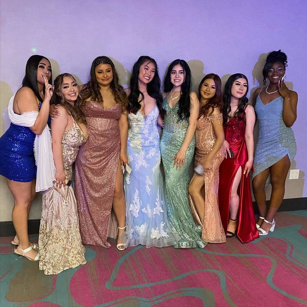 group of students posing for a prom photo