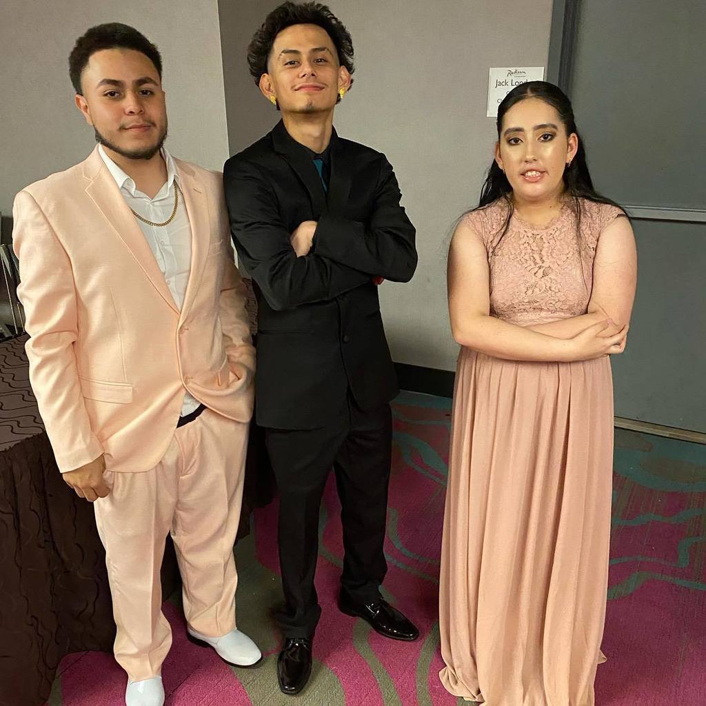 Group of friends posing for prom photos